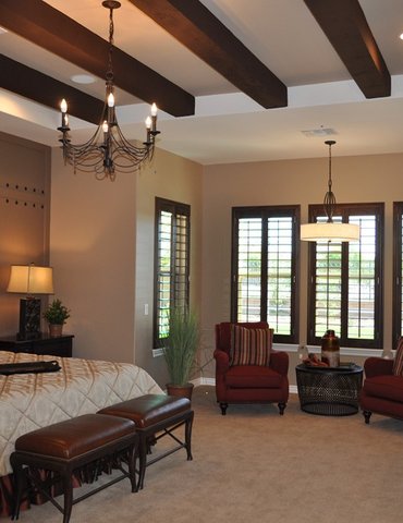 bedroom with chandelier